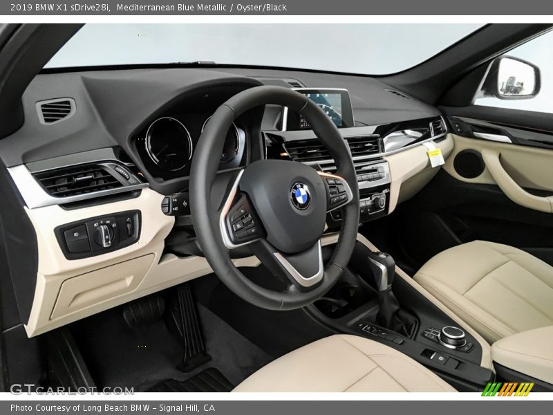 Mediterranean Blue Metallic / Oyster/Black 2019 BMW X1 sDrive28i