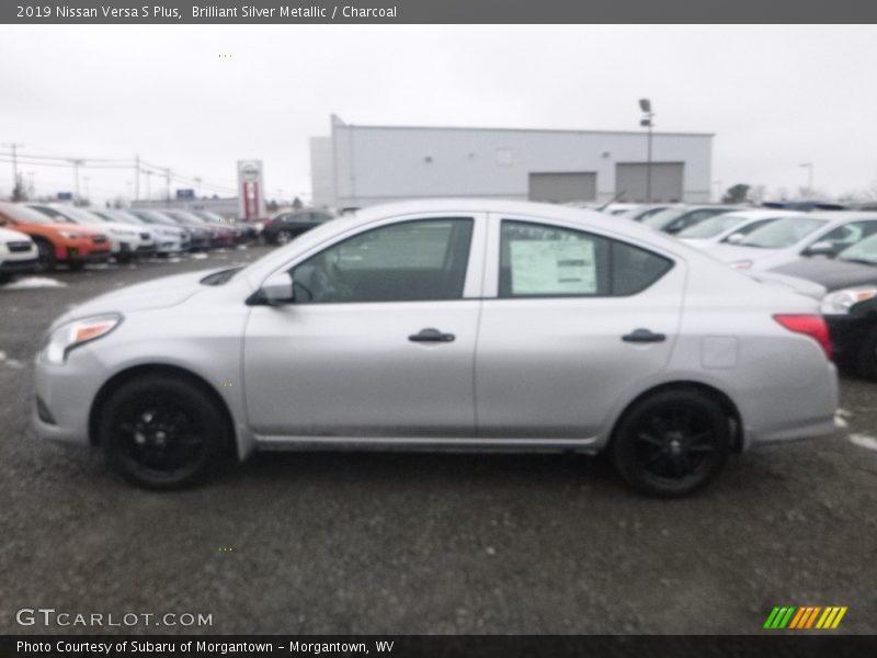 Brilliant Silver Metallic / Charcoal 2019 Nissan Versa S Plus