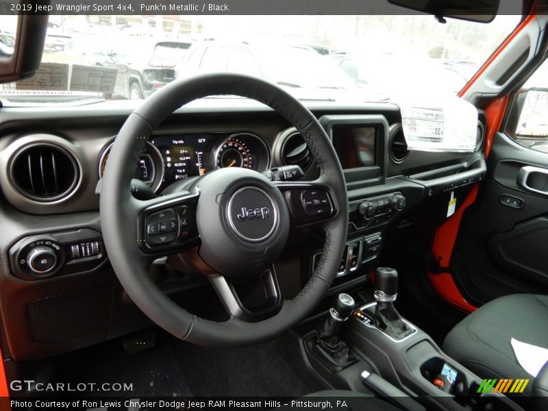 Dashboard of 2019 Wrangler Sport 4x4