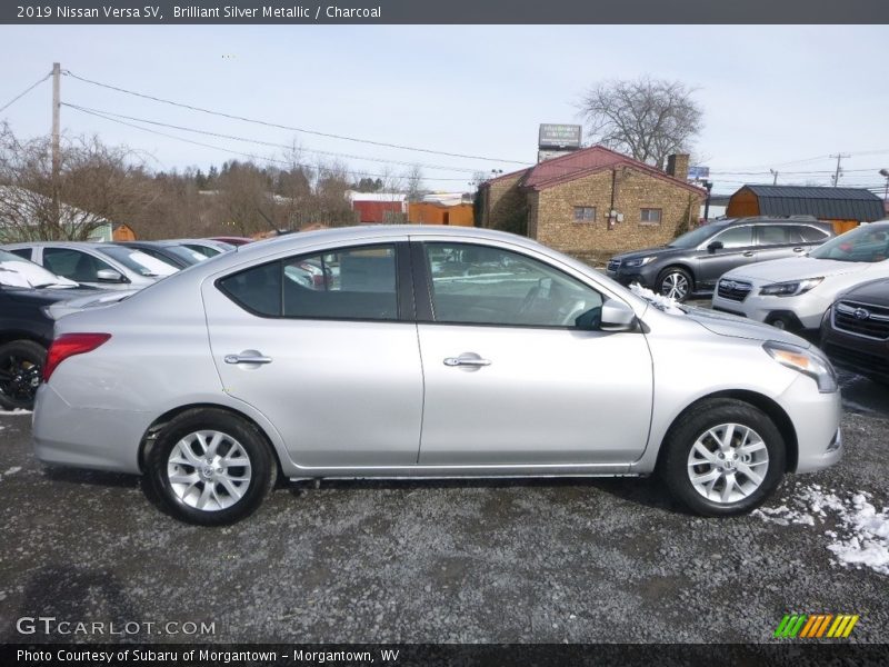 Brilliant Silver Metallic / Charcoal 2019 Nissan Versa SV
