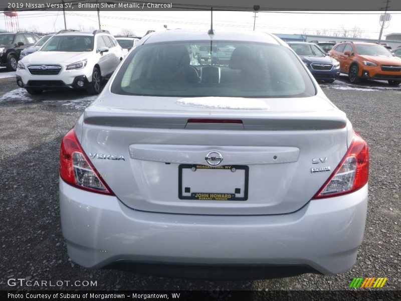 Brilliant Silver Metallic / Charcoal 2019 Nissan Versa SV
