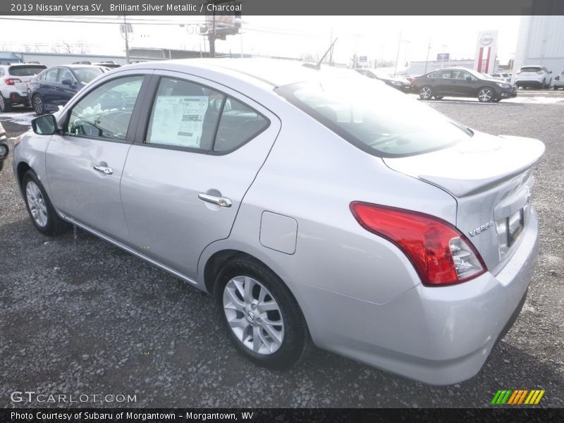 Brilliant Silver Metallic / Charcoal 2019 Nissan Versa SV
