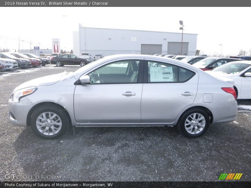 Brilliant Silver Metallic / Charcoal 2019 Nissan Versa SV