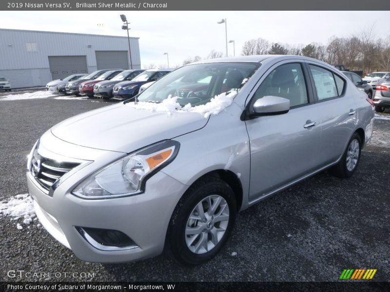 Brilliant Silver Metallic / Charcoal 2019 Nissan Versa SV