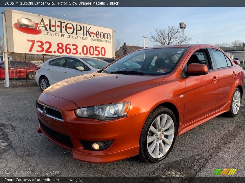 Rotor Glow Orange Metallic / Black 2009 Mitsubishi Lancer GTS