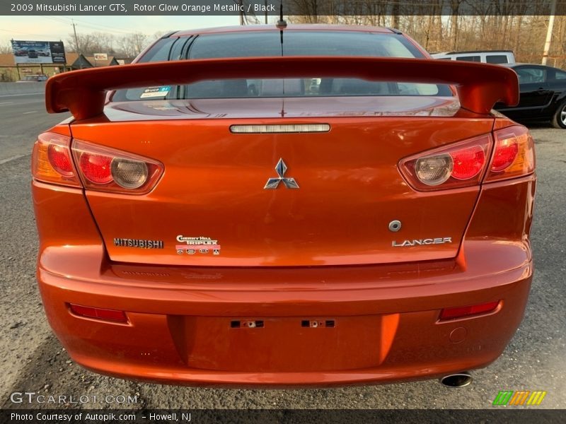 Rotor Glow Orange Metallic / Black 2009 Mitsubishi Lancer GTS