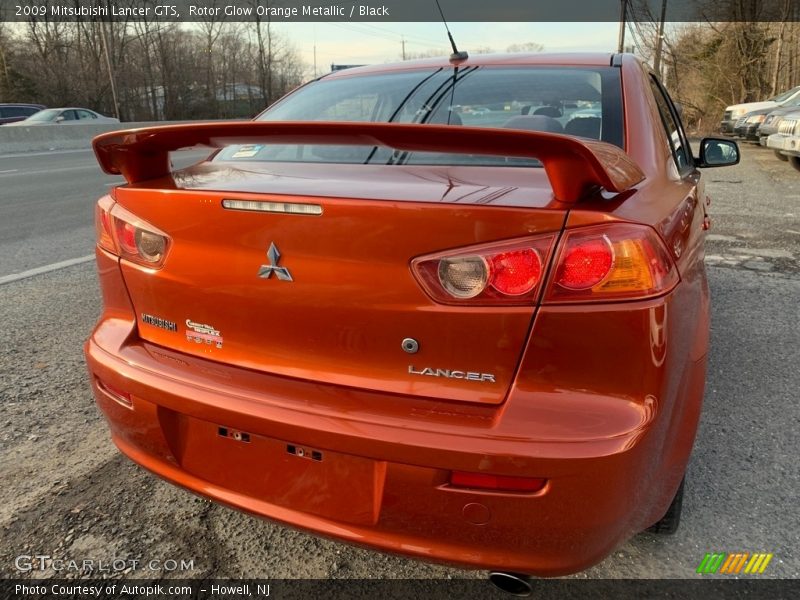 Rotor Glow Orange Metallic / Black 2009 Mitsubishi Lancer GTS