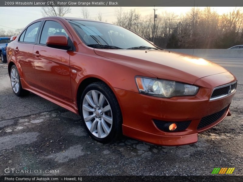 Rotor Glow Orange Metallic / Black 2009 Mitsubishi Lancer GTS