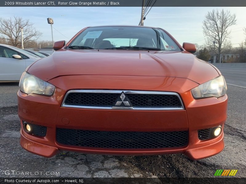 Rotor Glow Orange Metallic / Black 2009 Mitsubishi Lancer GTS