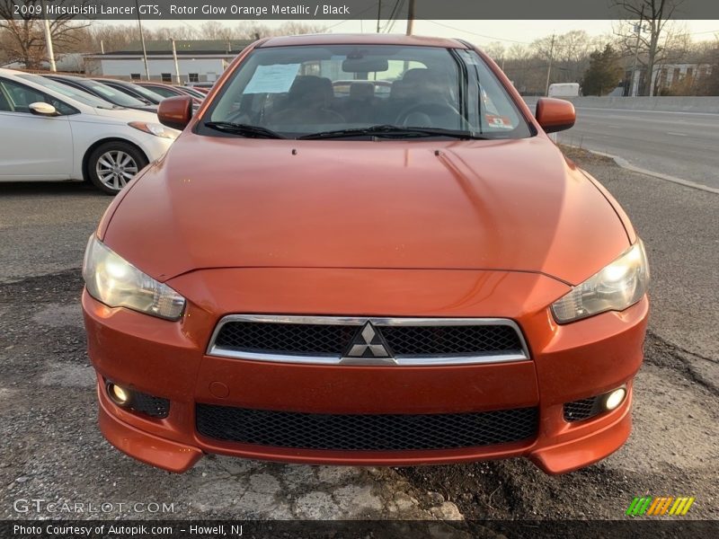 Rotor Glow Orange Metallic / Black 2009 Mitsubishi Lancer GTS