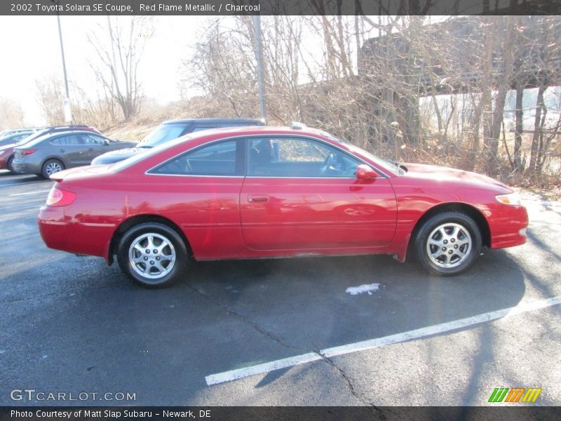 Red Flame Metallic / Charcoal 2002 Toyota Solara SE Coupe
