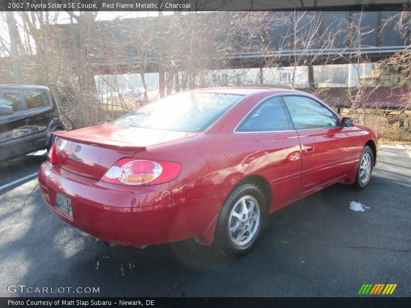 Red Flame Metallic / Charcoal 2002 Toyota Solara SE Coupe