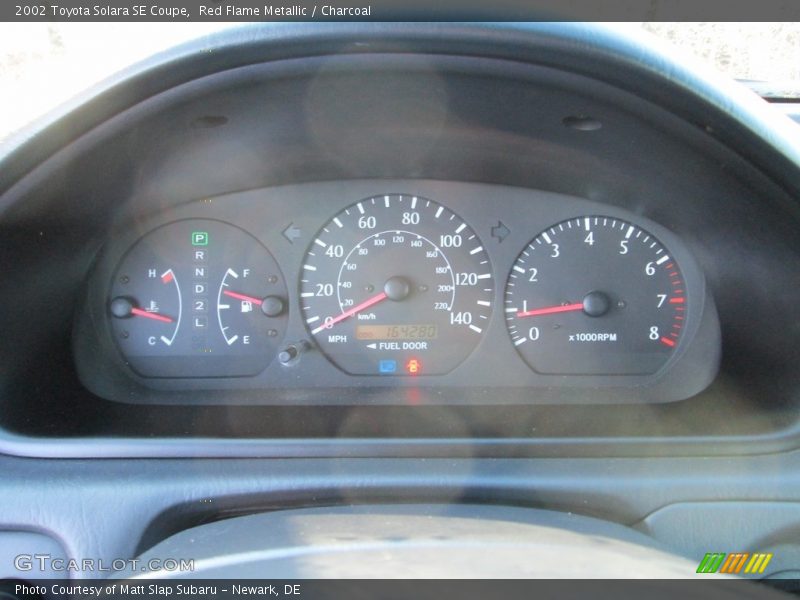 Red Flame Metallic / Charcoal 2002 Toyota Solara SE Coupe