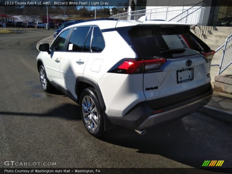 Blizzard White Pearl / Light Gray 2019 Toyota RAV4 LE AWD