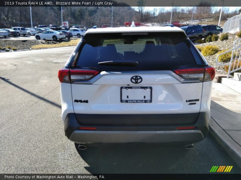 Blizzard White Pearl / Light Gray 2019 Toyota RAV4 LE AWD
