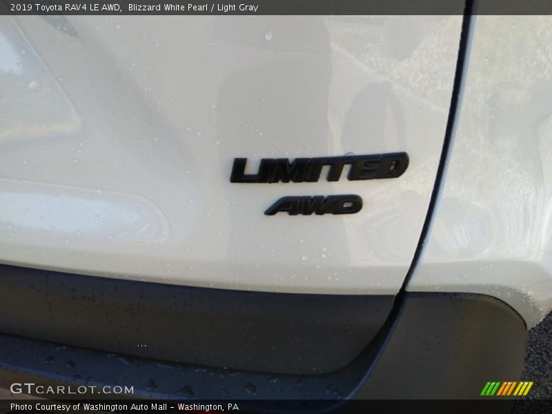 Blizzard White Pearl / Light Gray 2019 Toyota RAV4 LE AWD
