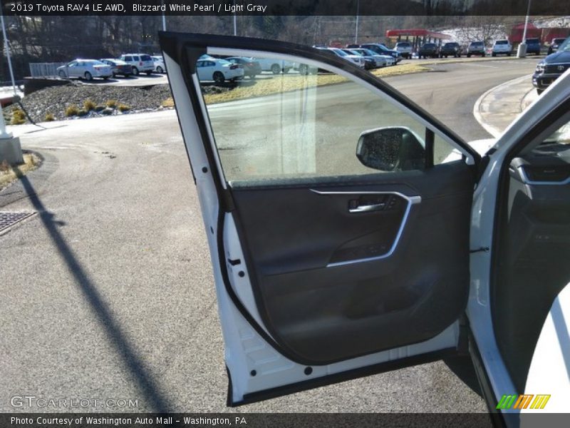 Blizzard White Pearl / Light Gray 2019 Toyota RAV4 LE AWD