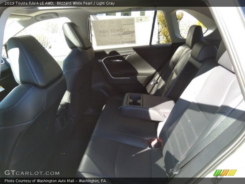 Blizzard White Pearl / Light Gray 2019 Toyota RAV4 LE AWD