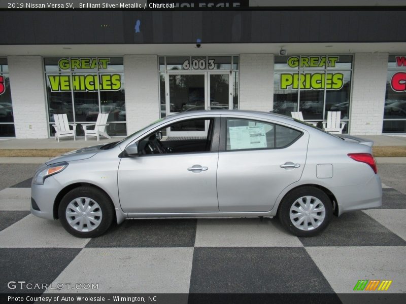 Brilliant Silver Metallic / Charcoal 2019 Nissan Versa SV