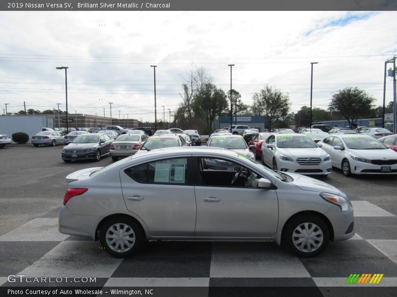 Brilliant Silver Metallic / Charcoal 2019 Nissan Versa SV