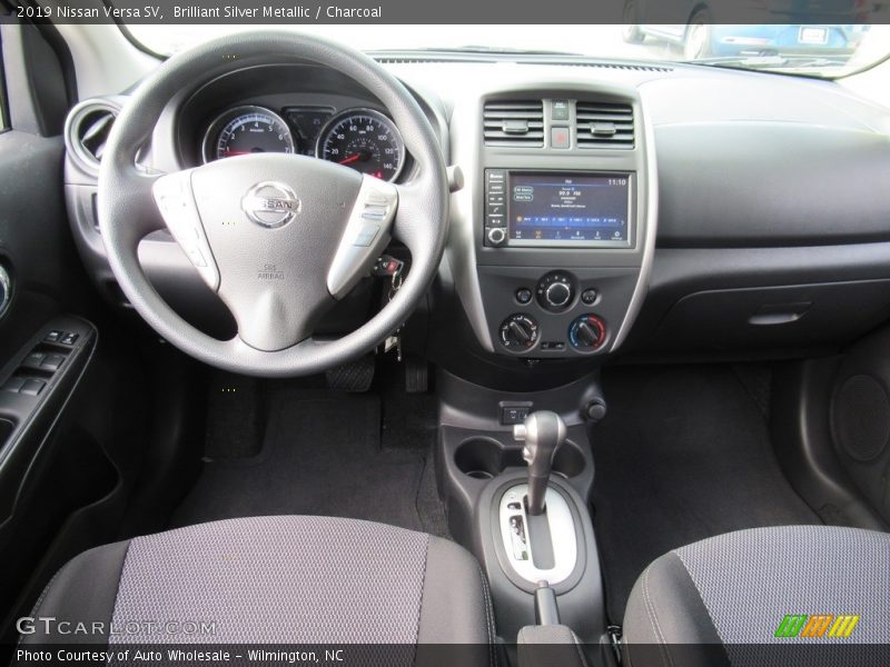 Brilliant Silver Metallic / Charcoal 2019 Nissan Versa SV