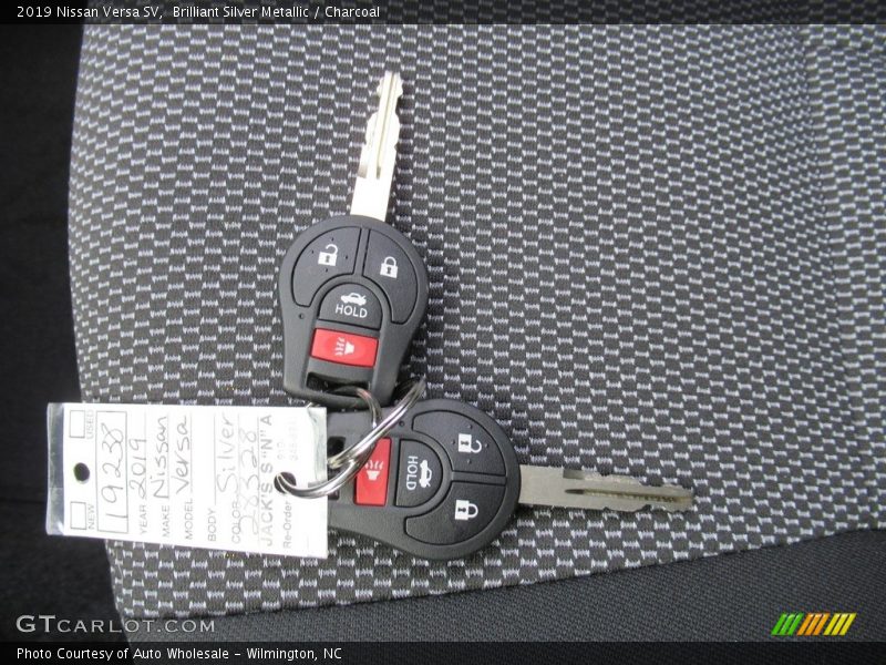 Brilliant Silver Metallic / Charcoal 2019 Nissan Versa SV