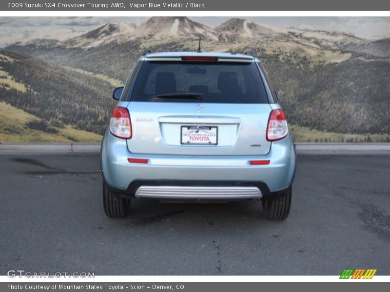 Vapor Blue Metallic / Black 2009 Suzuki SX4 Crossover Touring AWD