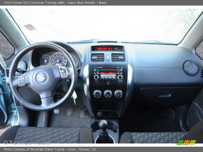 Vapor Blue Metallic / Black 2009 Suzuki SX4 Crossover Touring AWD