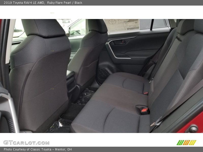 Ruby Flare Pearl / Black 2019 Toyota RAV4 LE AWD