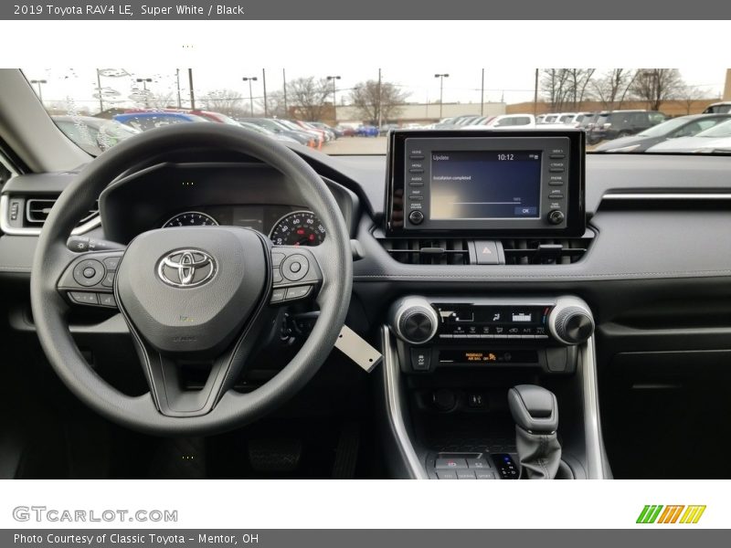 Super White / Black 2019 Toyota RAV4 LE