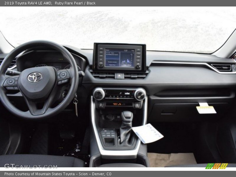Ruby Flare Pearl / Black 2019 Toyota RAV4 LE AWD