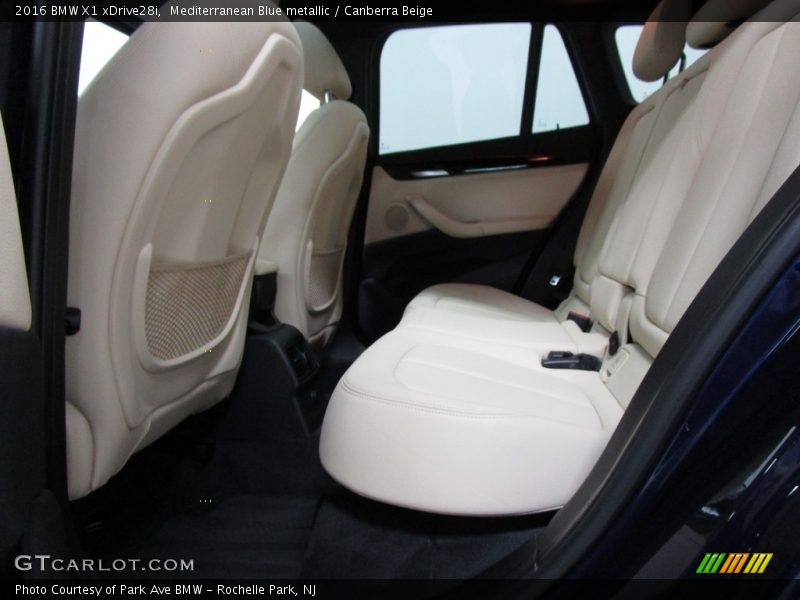 Mediterranean Blue metallic / Canberra Beige 2016 BMW X1 xDrive28i