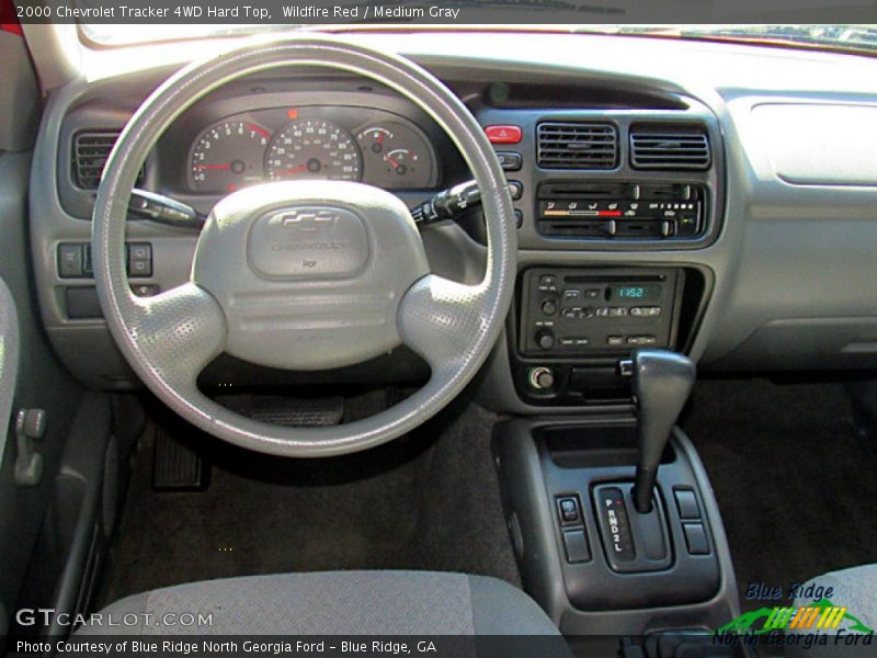 Wildfire Red / Medium Gray 2000 Chevrolet Tracker 4WD Hard Top