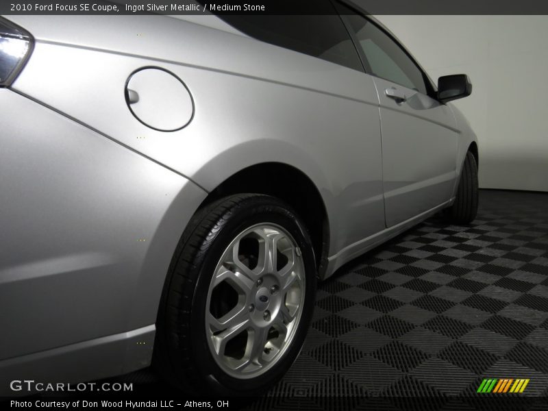 Ingot Silver Metallic / Medium Stone 2010 Ford Focus SE Coupe