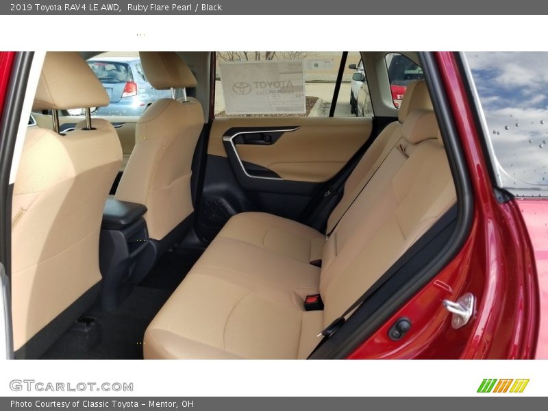 Ruby Flare Pearl / Black 2019 Toyota RAV4 LE AWD
