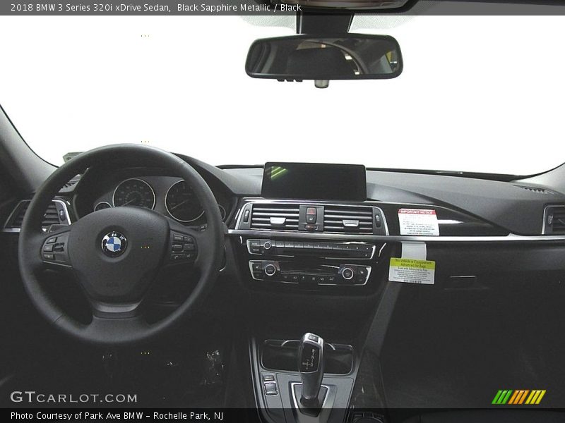 Black Sapphire Metallic / Black 2018 BMW 3 Series 320i xDrive Sedan