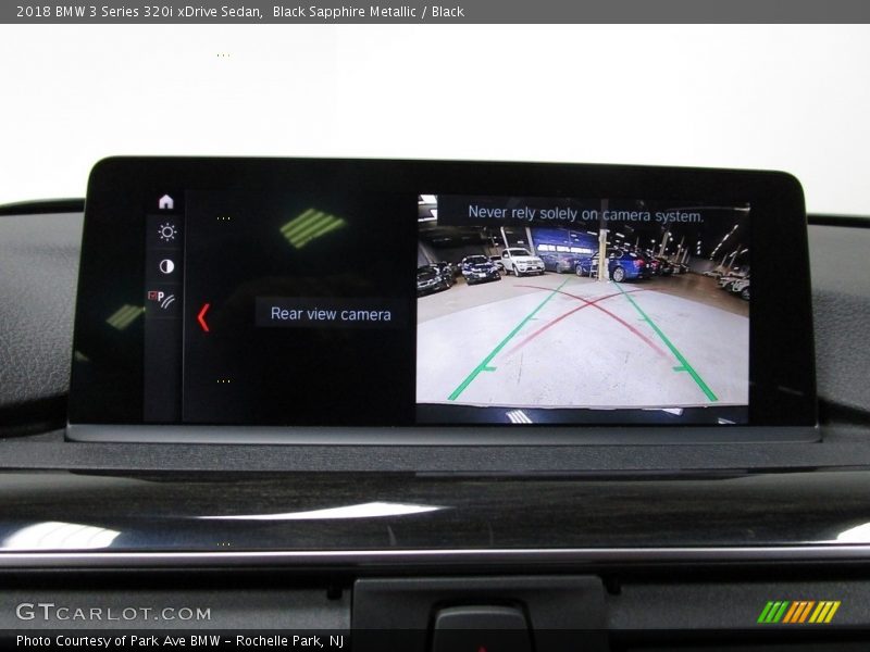 Black Sapphire Metallic / Black 2018 BMW 3 Series 320i xDrive Sedan