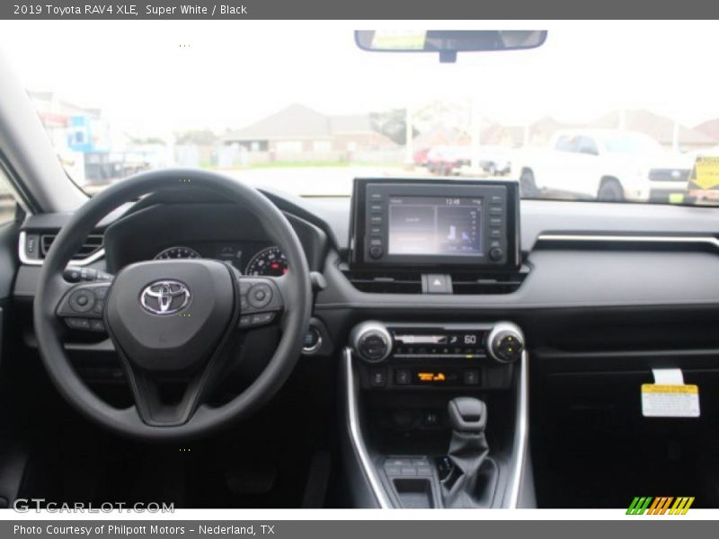 Super White / Black 2019 Toyota RAV4 XLE