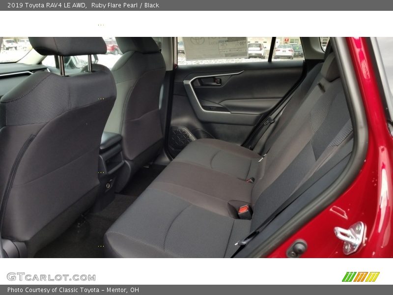 Ruby Flare Pearl / Black 2019 Toyota RAV4 LE AWD
