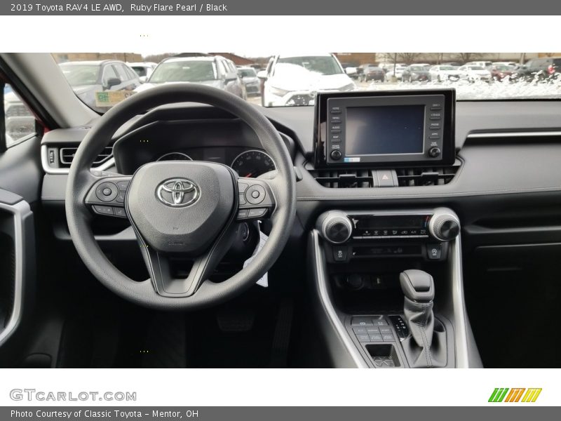 Ruby Flare Pearl / Black 2019 Toyota RAV4 LE AWD