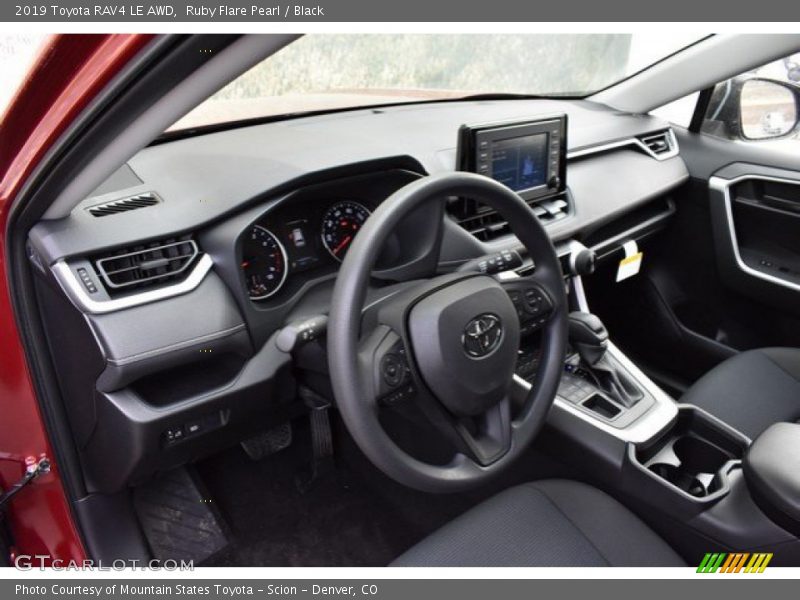 Ruby Flare Pearl / Black 2019 Toyota RAV4 LE AWD