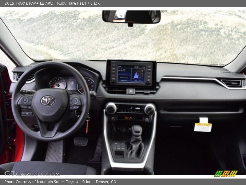 Ruby Flare Pearl / Black 2019 Toyota RAV4 LE AWD