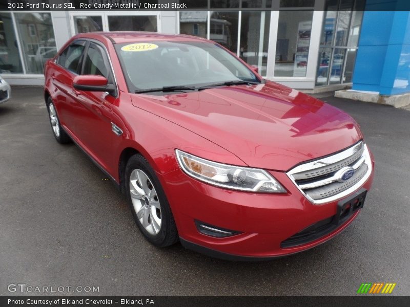 Red Candy Metallic / Charcoal Black 2012 Ford Taurus SEL