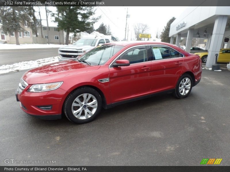 Red Candy Metallic / Charcoal Black 2012 Ford Taurus SEL
