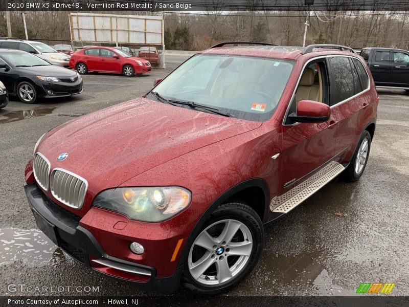 Vermilion Red Metallic / Sand Beige 2010 BMW X5 xDrive48i