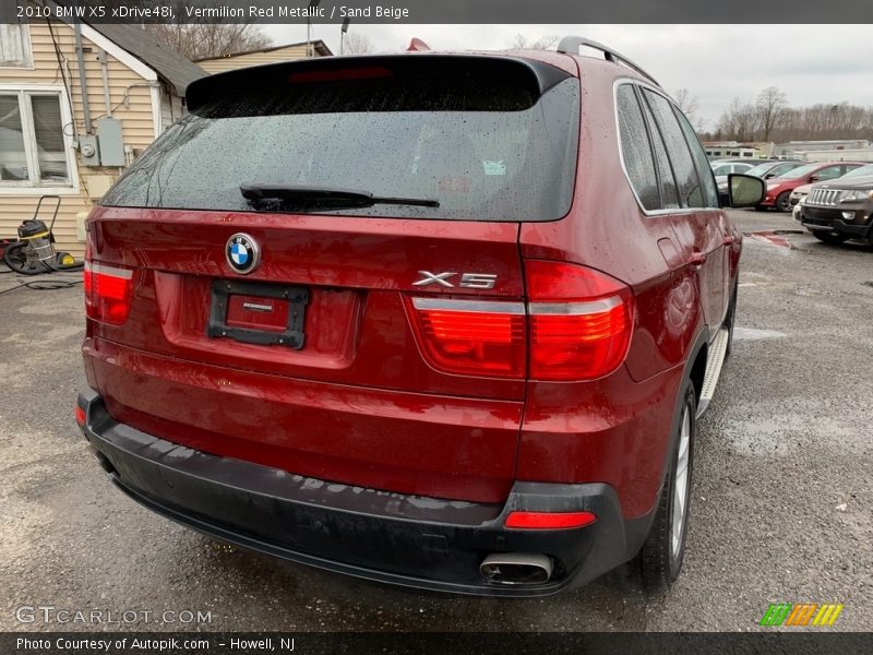 Vermilion Red Metallic / Sand Beige 2010 BMW X5 xDrive48i