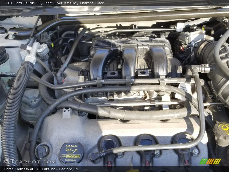 Ingot Silver Metallic / Charcoal Black 2010 Ford Taurus SEL