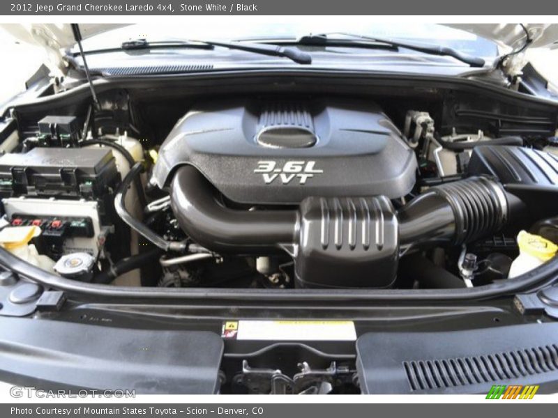 Stone White / Black 2012 Jeep Grand Cherokee Laredo 4x4