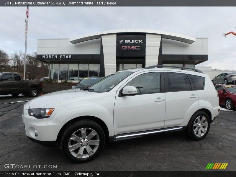 Diamond White Pearl / Beige 2011 Mitsubishi Outlander SE AWD