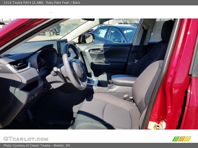 Ruby Flare Pearl / Black 2019 Toyota RAV4 LE AWD